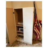 Wood  cabinet with contents and flags.