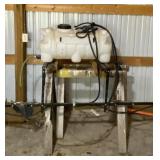 Portable sprayer with long beam. Sawhorses go