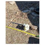 Post hole digger and less than half a bag of