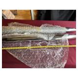 Two chrome motorcycle mufflers