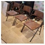 Three steel with vinyl backs and seat fold up
