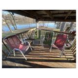 Mesh green and red deck chairs with small wooden