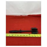 The Pampered Chef masher.