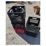 Five plastic crates
