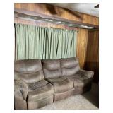 Microfiber couch with two reclining ends. Some
