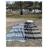 Two Indian blankets witu tote and lid.