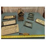 Fishing and hunting signs, hanging picture frames