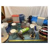 Basket with can coolers, plastic containers,