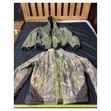 Carhartt and Under Armour size XL jackets.