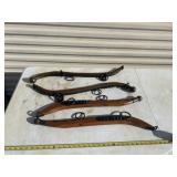 horse hames, which are curved wooden and metal