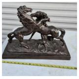 a vintage bronze-finished metal sculpture