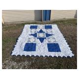 95x77 white and blue quilt with blue underside