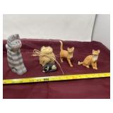 Collection of cat figurines, porcelain and wood,