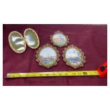 ornate oval wall art frames, likely made of brass