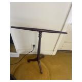 Possibly a candle stand or sock stand