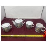 Porcelain tea pot with 2 cups with lids and a