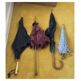 Umbrellas, one with bake light on the end