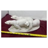 Polar Trio" resin sculpture, likely produced by