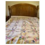 Double Wedding Ring Quilt measures 63 x 78
