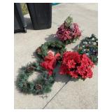 Christmas wreaths, lights and artificial flower