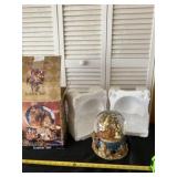 Grandeur Noel snow globe musical and works.