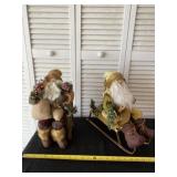 Victoria  Style Santaï¿½s on chair and sled.