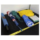 Umbrellas and ponchos.