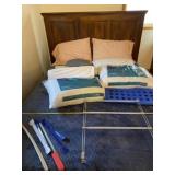 Blue bed spread, door hanger, pillows and back