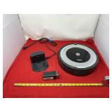 Vacuum robot with charger does work