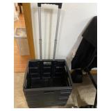 Black plastic pull cart on two wheels with extend