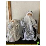 Two victorian style Santa Claus