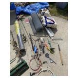 Tarps, chicken wire, yard decor and everything on