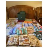 Tablecloths, place mats and tote with lid.