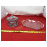 glass dish featuring the embossed phrase "WASTE