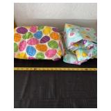 Two Easter plastic table cloths.