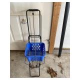 Plastic crate with push cart .