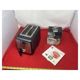 Burger press and wax paper with toaster