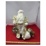 vintage 16-inch Santa Claus figurine dressed in a