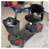 Scout Drive scooter with two keys and charger.,