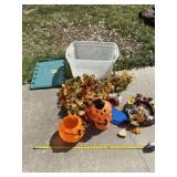 Tote with lid and fall decor.