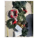 Christmas wreaths , Christmas tree stand and all