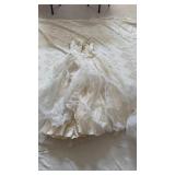 Womans small wedding dress and veil