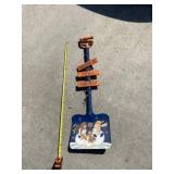 Shovel painted in Illini scene.