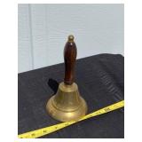 Brass and wood bell.