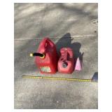 5 gallon 2 gallon gas jugs with contents and