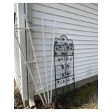 Plastic and iron trellises .