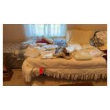 Bedding, queen , pillows, and misc. bed not