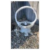 Heavy concrete basket will need help to pick up