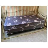 Brass day bed with bottom pull out mattress.