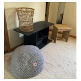 Black tv stand, wood table, wicker trash basket ,
